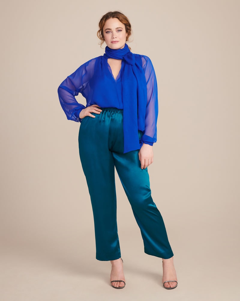 Front of a model wearing a size 14 Satin Icon Track Pant in Teal Blue by Juan Carlos Obando. | dia_product_style_image_id:226707